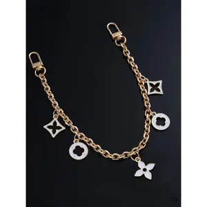 Luxury Monogram-style Bag Charm, Gold Enamel Flower Purse Chain In White And Black, Elegant Chain Strap Extender For Stylish Tote Bag Decoration