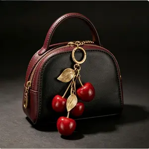 Vintage Distressed Gold Cherry Keychain, Glossy Red 4-Piece Cherry Cluster With Textured Metal Leaves, Durable Alloy Spring Hook, Elegant French Style Fruit Bag Charm For Handbags & Car Keys