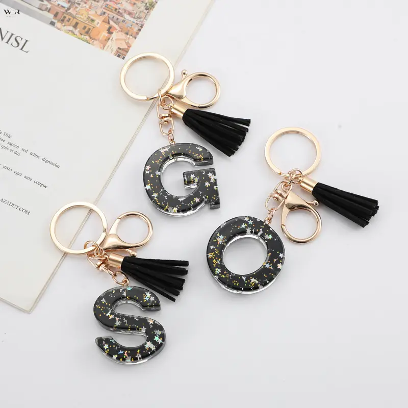 Elegant Initial Keychain for Women, Sparkling Star Resin Letter Charm with Feminine Tassel Accent on Gold-Tone Hardware, Gold Elegant Keychains, Personalized Nameplate Keychains, Glitter Details Keychains