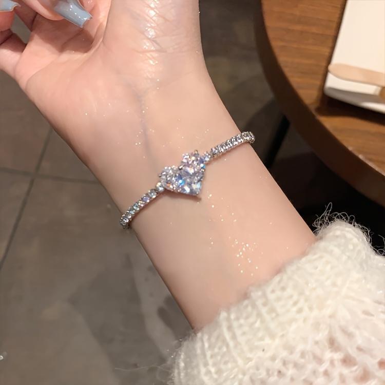 A Luxurious Heart-Shaped Adjustable Bracelet, Adorned with Zirconia - a Stylish Accessory Made of Copper, Perfect As a Gift for a Loved One, Partner, Or Best Friend