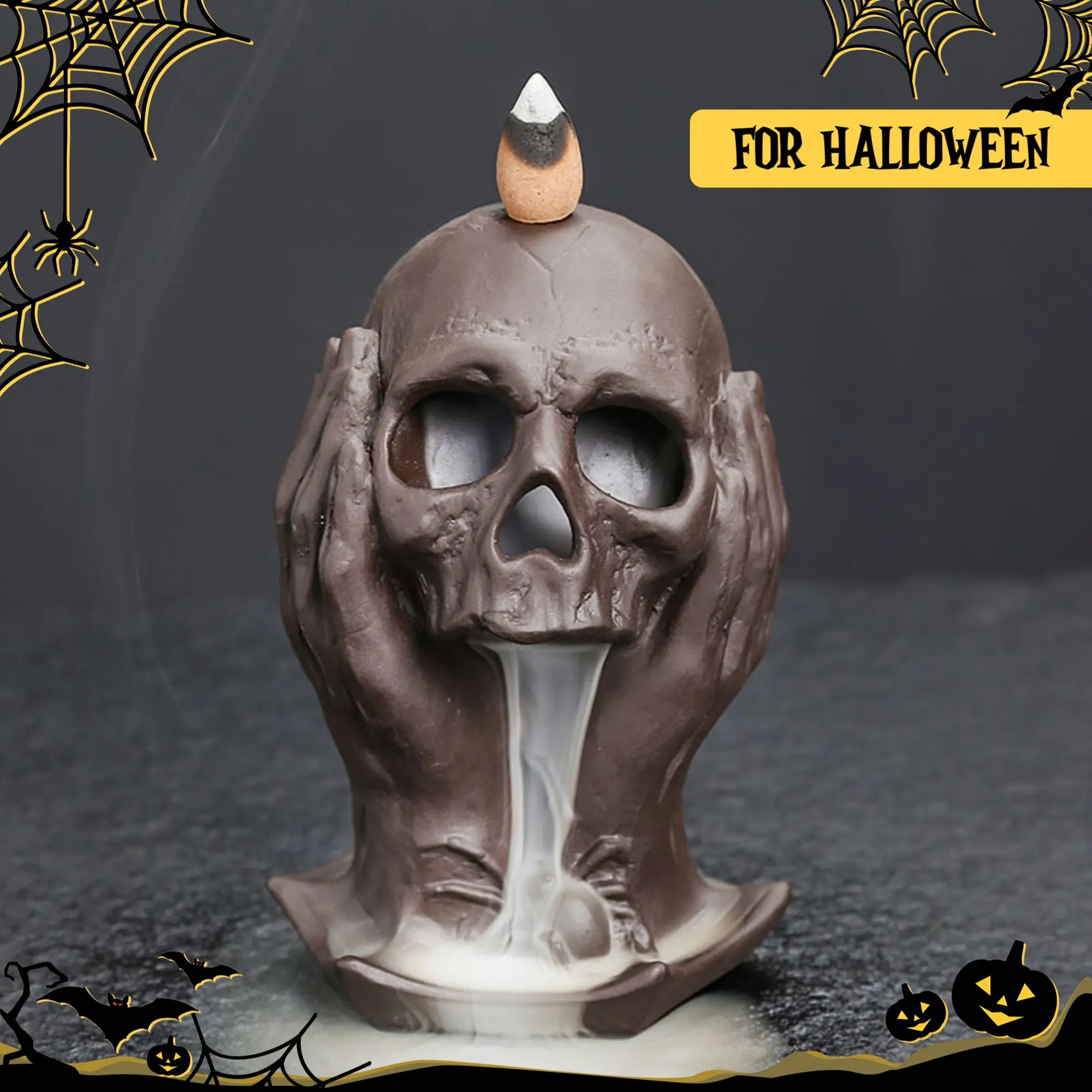 Skull-shaped backflow incense burner. Its distinctive skull design creates a strong eerie atmosphere. Perfect for placement on home desktops, it is a unique decorative ornament ideal for Halloween.