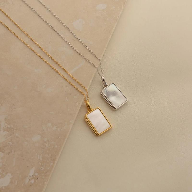 Pearl Locket Necklace by Caitlyn Minimalist.