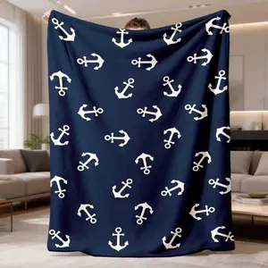 2026 New Flannel Throw Blanket With A Dark Blue Base And White Anchor Design, Featuring A Nautical Theme. This Soft And Cozy Blanket Is Perfect For Use On Sofas, In Offices, On Beds, And For Camping Or Traveling