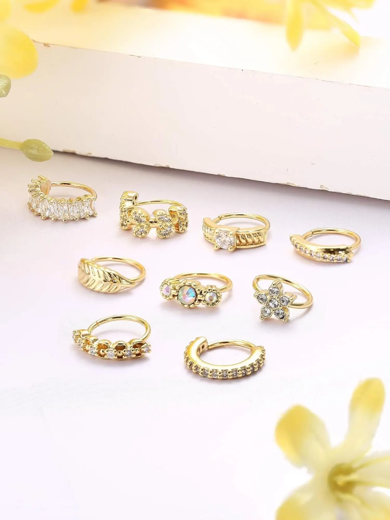 9 Pcs Stackable Nasal Ornament, Nose Ring Jewelry, for Unisex Daily Wedding Party Seaside Styling Lustrous Warm Golden Open C Clip Stainless Steel Nose Ring Pack Bright CZ Assorted Patterns Star Feather Flower Curved Hoops Delicate Lightweight Design
