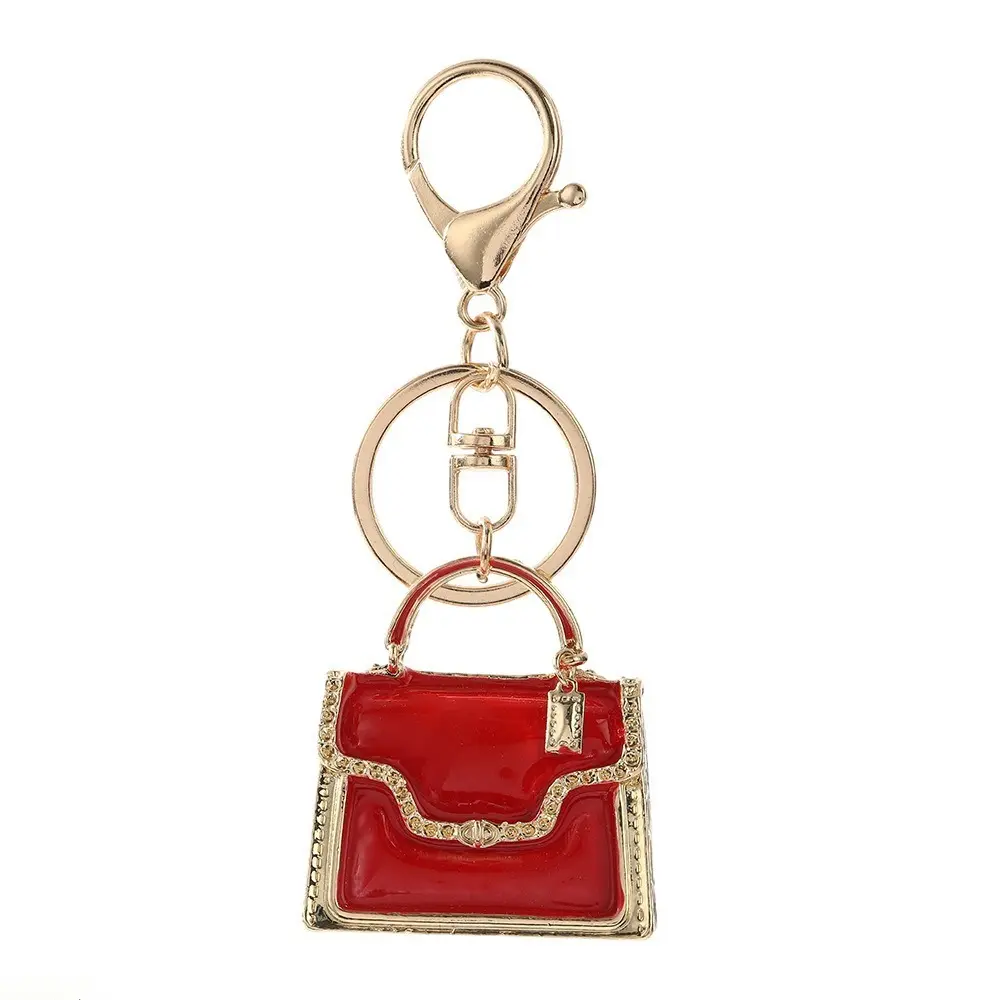 Alloy bag charm featuring a premium, anti-oxidizing, multi-layered metal pendant with a high-end sheen; a sophisticated accessory suitable for handbags, backpacks, car rearview mirrors, and everyday use.