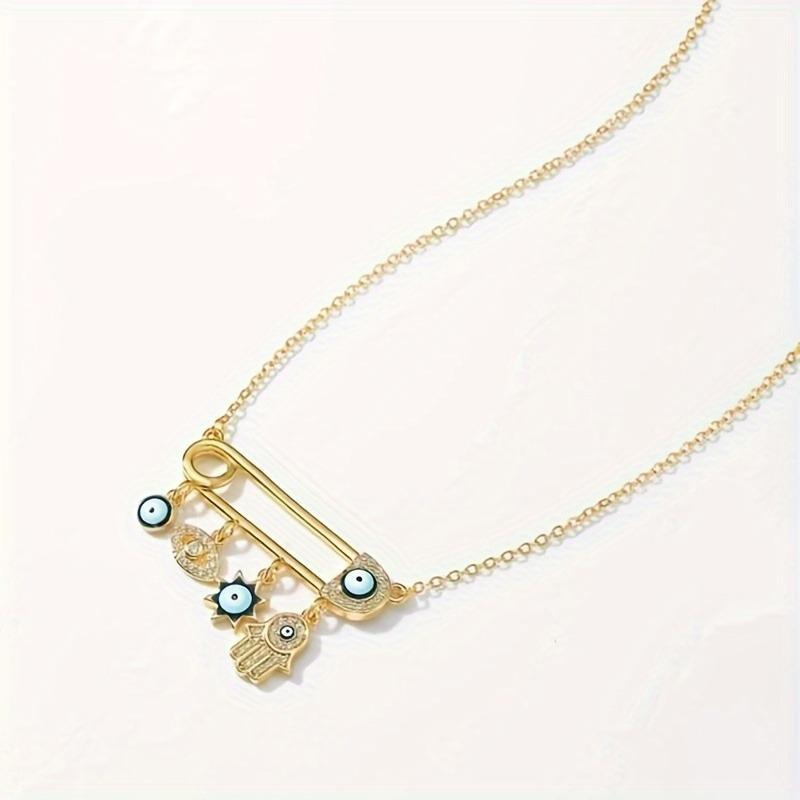 Golden Plated Evil Eye Hamsa Hand Choker Necklace with Rhinestone Safety Pin Charm – Boho Lucky Amulet for Women and Girls