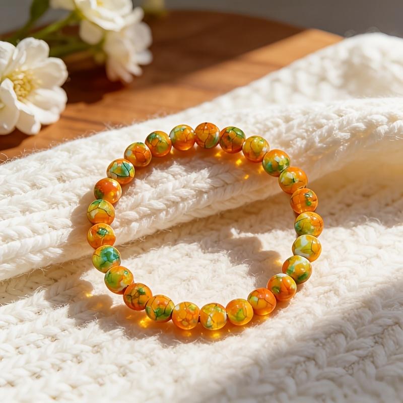 [Rain Flower Stone Bracelet] A Smooth Orange-Yellow Rain Flower Stone Bracelet That Attracts Wealth, Handcrafted And Elastic, Symbolizes Fortune And Luck, Suitable for Both Men And Women, Perfect for Everyday Wear And As a Gift