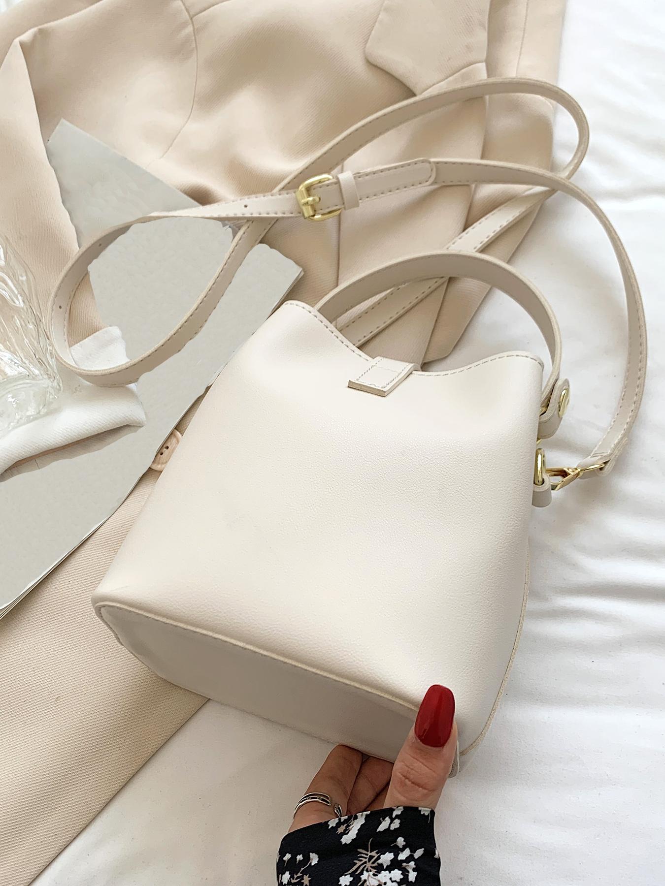 Niche design bucket crossbody bag, simple textured metal buckle decorated single shoulder crossbody handbag, fashionable and versatile daily commuting essential item, large capacity suitable for office workers, shopping, etc.