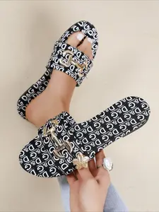 Fabric slide sandals with allover letter print, black non-slip flat sole, versatile for spring-summer daily and vacation.