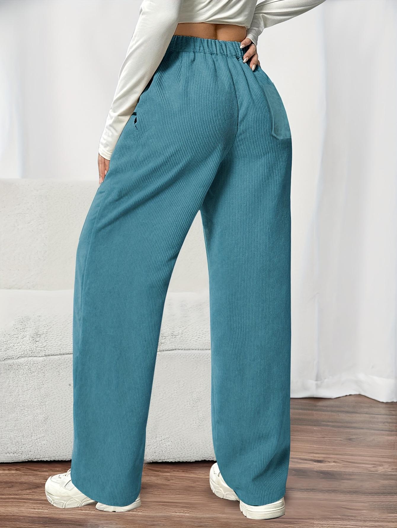 Women's Corduroy Jogger Pants for Spring and Autumn, featuring solid colors with drawstring pockets. Crafted from soft and comfortable fabric, these pants are ideal for everyday casual wear.