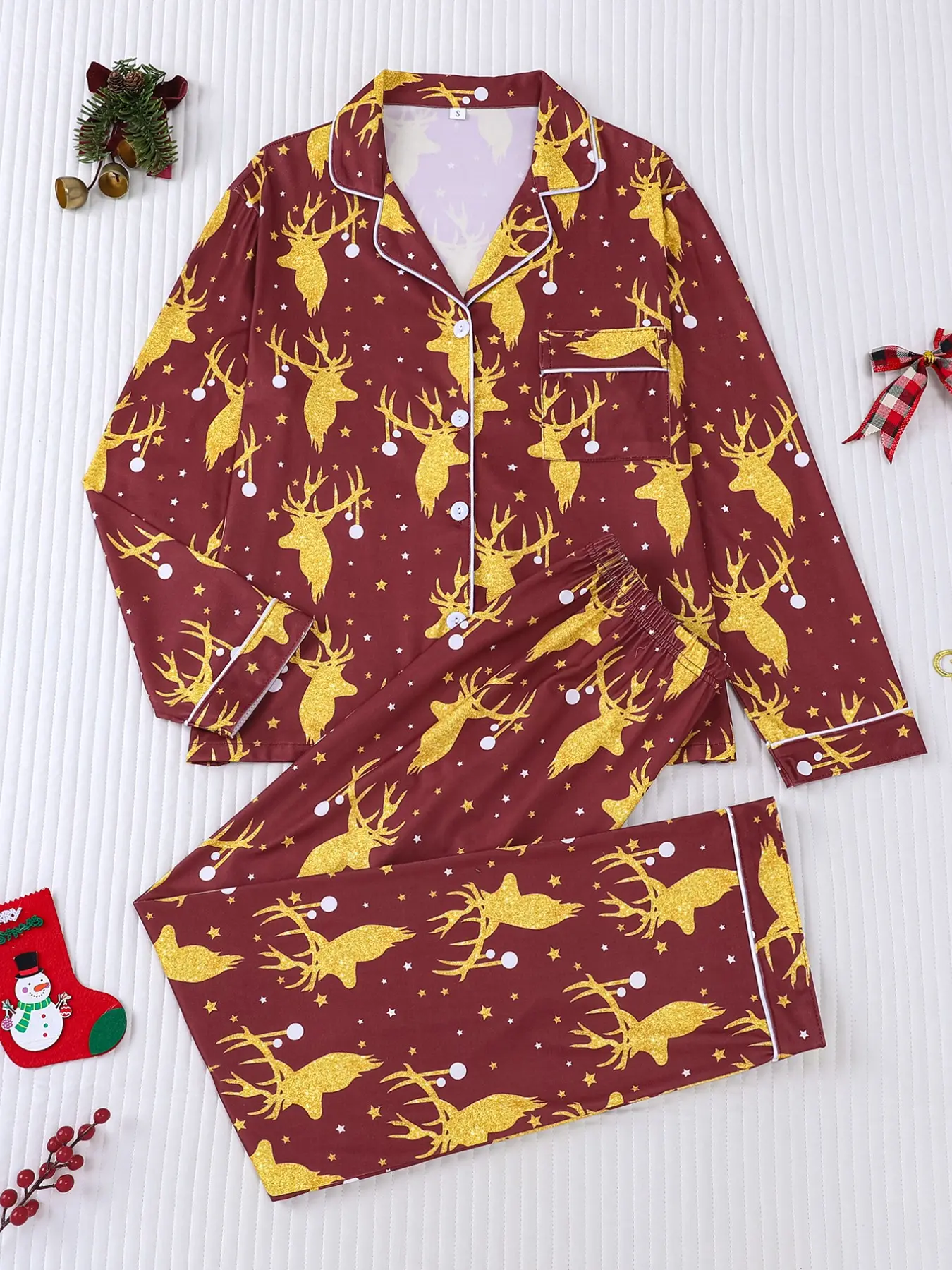 Women's 2-piece Christmas pajama set, burgundy base with golden deer, star and dot all-over print. Festive holiday vibe with white contrast trim. Lapel long sleeve top with pocket, elastic waist long pants, soft comfy loungewear for all-season wear