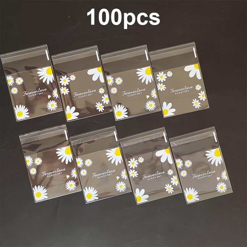 100pcs daisy print gift bag, transparent self-adhesive small packaging bag suitable for wedding return gifts, birthday tea parties, small gift packaging, independent packaging bags for biscuit baking all year round