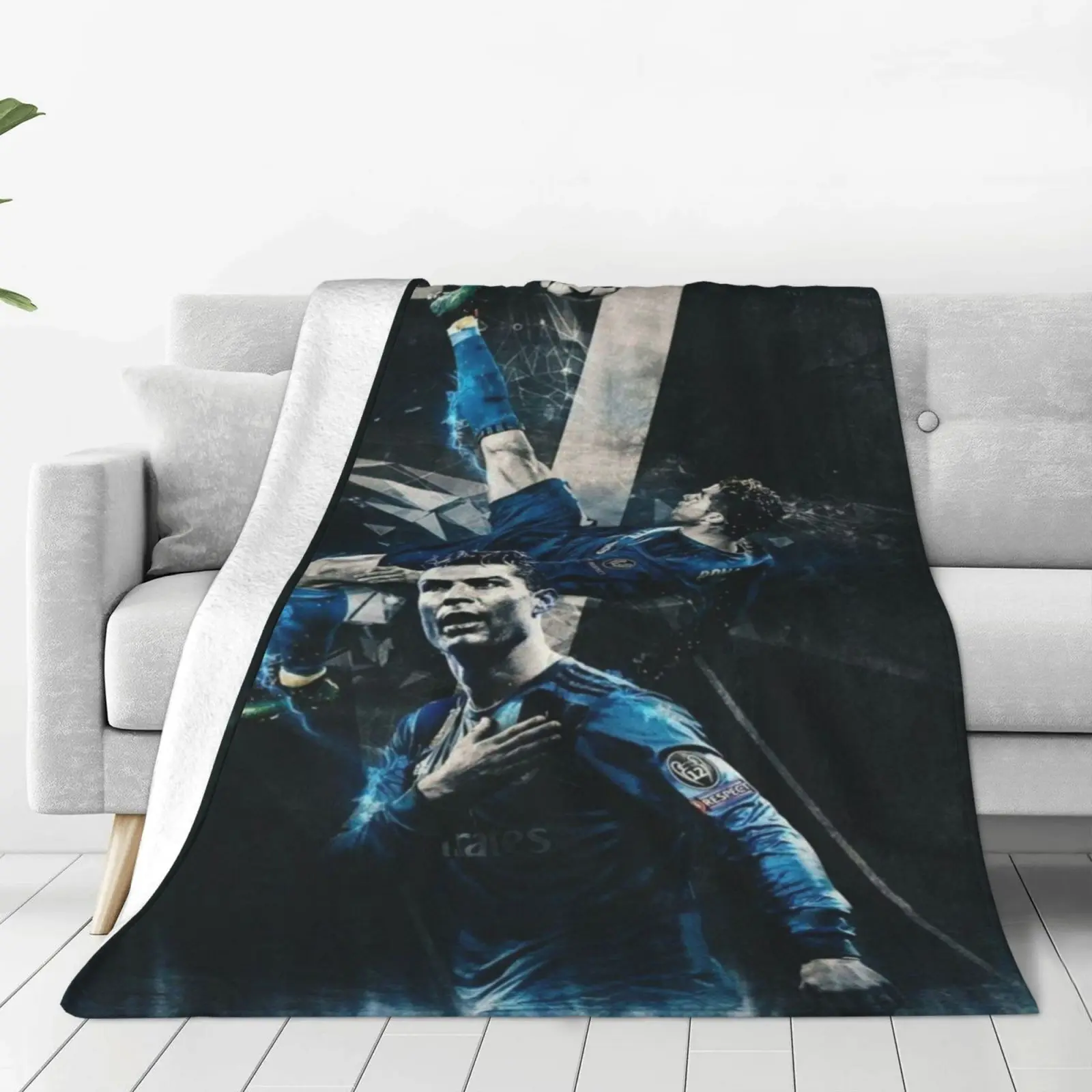 This blanket features a Cristiano Ronaldo-themed print, is soft, comfortable, and durable, making it perfect for home use or camping trips.