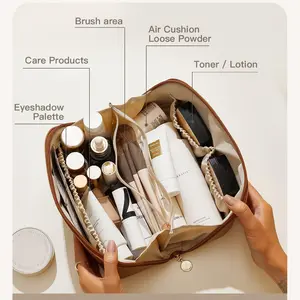 Large-capacity waterproof PU makeup organizer with a multi-layer pleated design and separate compartments, ideal for storing skincare products during daily travel