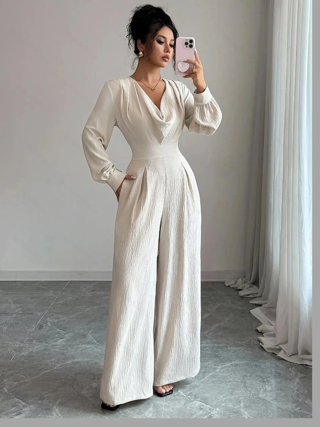 A fashionable women's beige swing collar long sleeved wide leg jumpsuit, with a high waist and a cinched waist that looks taller and slimmer, suitable for commuting to work, shopping and outdoor activities, indoor and outdoor dressing, Plain Jumpsuits