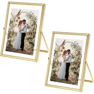 2 Packs Gold 5 x 7'' Floating Frame, Floating Picture Frames for Photo Sizes 3.5 x 5'', 4 x 6'', Plated Metal Frames for Wedding, Office, Home Tabletop Shelf Display, Minimal Ornate