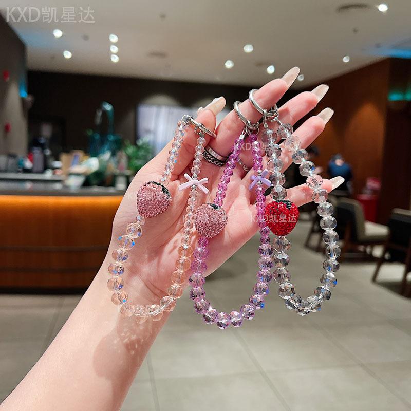 Premium sense rhinestone strawberry mobile phone chain crystal wrist beaded lanyard anti-drop crystal mobile phone chain anti-lost key chain Wireless Charm Aesthetic Cloth Smartphone Cellphone