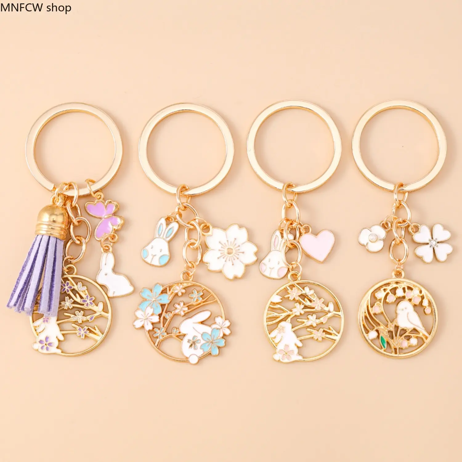 Cute Enamel Rabbit Keychain (featuring cherry blossom and bird charms, a purple tassel, and a gold ring) – Chinese Pastoral Style Bag Charm for Women – Birthday Gift