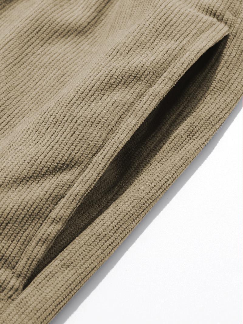 Two men's casual pants featuring a simple and versatile style with drawstring design, adding a casual feel. The pants have delicate small details, making them full of texture. The loose fit provides comfortable and relaxed wear, suitable for everyday outi