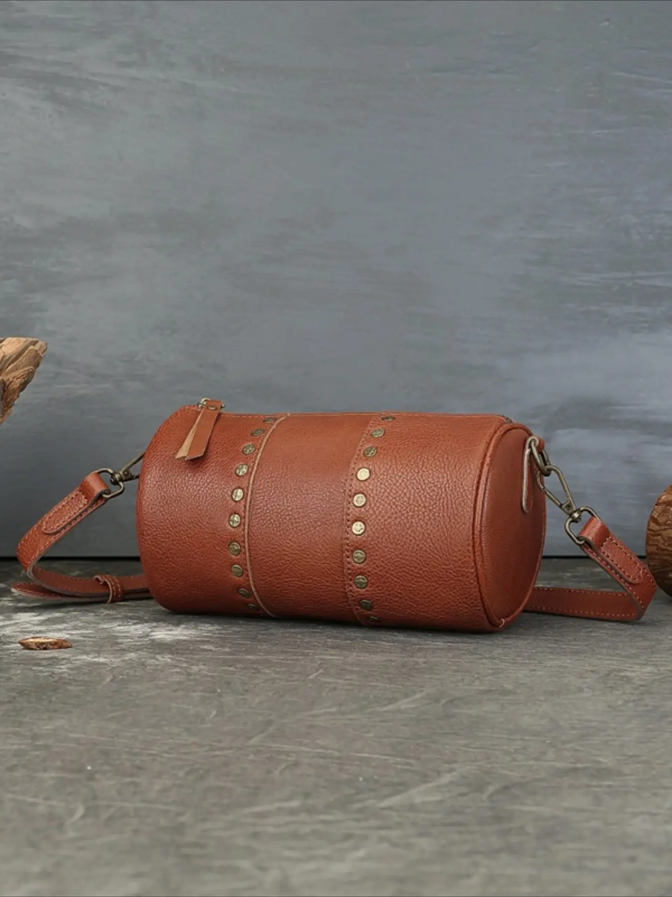 New leather rivet cylinder bag retro vegetable tanned niche design first layer cowhide single shoulder oblique span bag cross-border hot sale