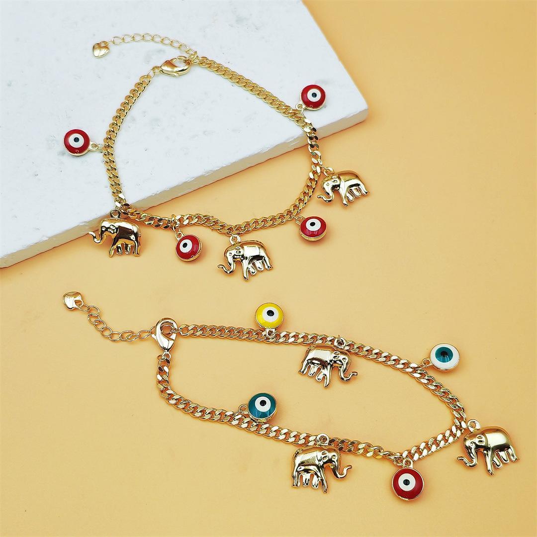Gold Devil's Eye Lucky Elephant AnkletY2K Aesthetic Red Evil Eye Pendant Anklet Adjustable Gold Plated Chain Anklet for Party Birthday Holiday Gift Daily Wearwith Baby Elephant Pendant Adjustable Length for Stylish Accessory