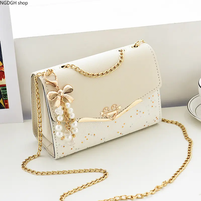 Elegant Pearl Bow Crossbody Bag for Women, Sparkling Star Chain Shoulder Purse, Sweet Cream PU Leather Evening Handbag, Gold Metal Cute Charm Clutch, Perfect for Date Night, Party, Wedding & Daily Sweet Look.