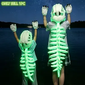A glow-in-the-dark dinosaur skeleton head mask with claws, a fluorescent green plush toy, a comfortable and durable costume for ancient creatures, perfect for family games, Halloween gifts, Children’s Day gifts, and Christmas presents.