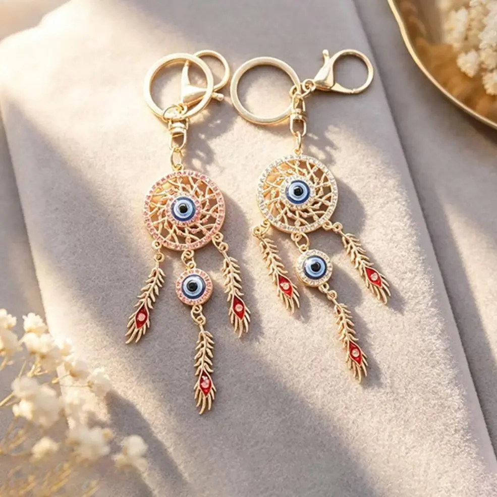 Cross-border new dream catcher creative diamond-encrusted hollow feather keychain car bag pendant metal small gift batch