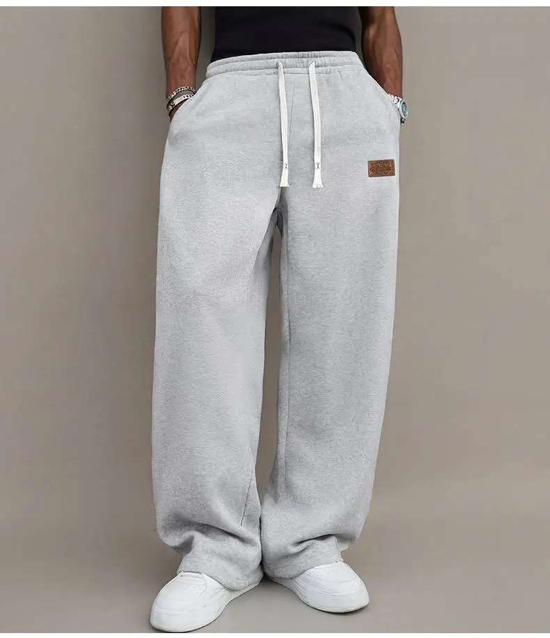 Men’s casual pants for autumn, cotton-blend stretch fabric, comfortable athletic-casual long pants with a loose straight fit; suitable for everyday wear and commuting; versatile sweatpants with drawstring; simple men’s casual pants. Men’s casual pants for autumn, cotton-blend stretch fabric, comfortable athletic-casual long pants with a loose straight fit; suitable for everyday wear and commuting; versatile sweatpants with drawstring; simple men’s casual pants.