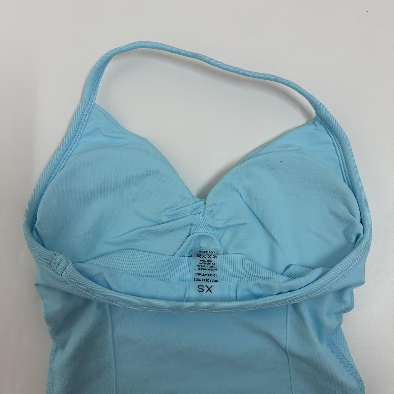 DFYNE Backless Fitness Tank Top with Built-in Bra Pads, Long Straps, and Elongated Cuffs for a Slimming Look, Ideal for Yoga Training.