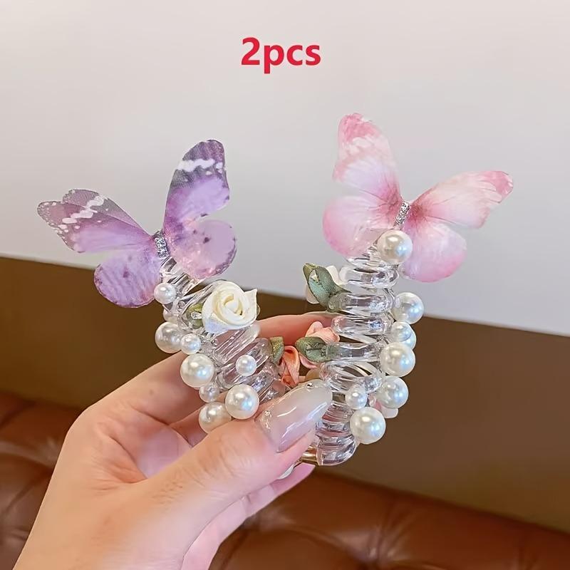 This set of three exquisite mesh butterfly-shaped telephone cord hair ties is perfect for girls.  Featuring a cute beaded flower design, these sweet hair accessories are suitable for everyday wear and parties.