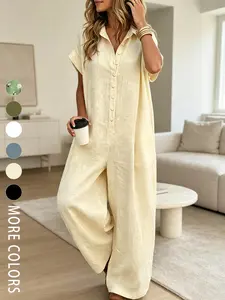 A lady's fashion French lazy-fit jumpsuit with a loose button-up design, featuring slimming wide-leg style, Womenswear Casual. Perfect for summer, suitable for light social occasions, afternoon tea, vacation trips, commuting, and at-home wear. Minimalist