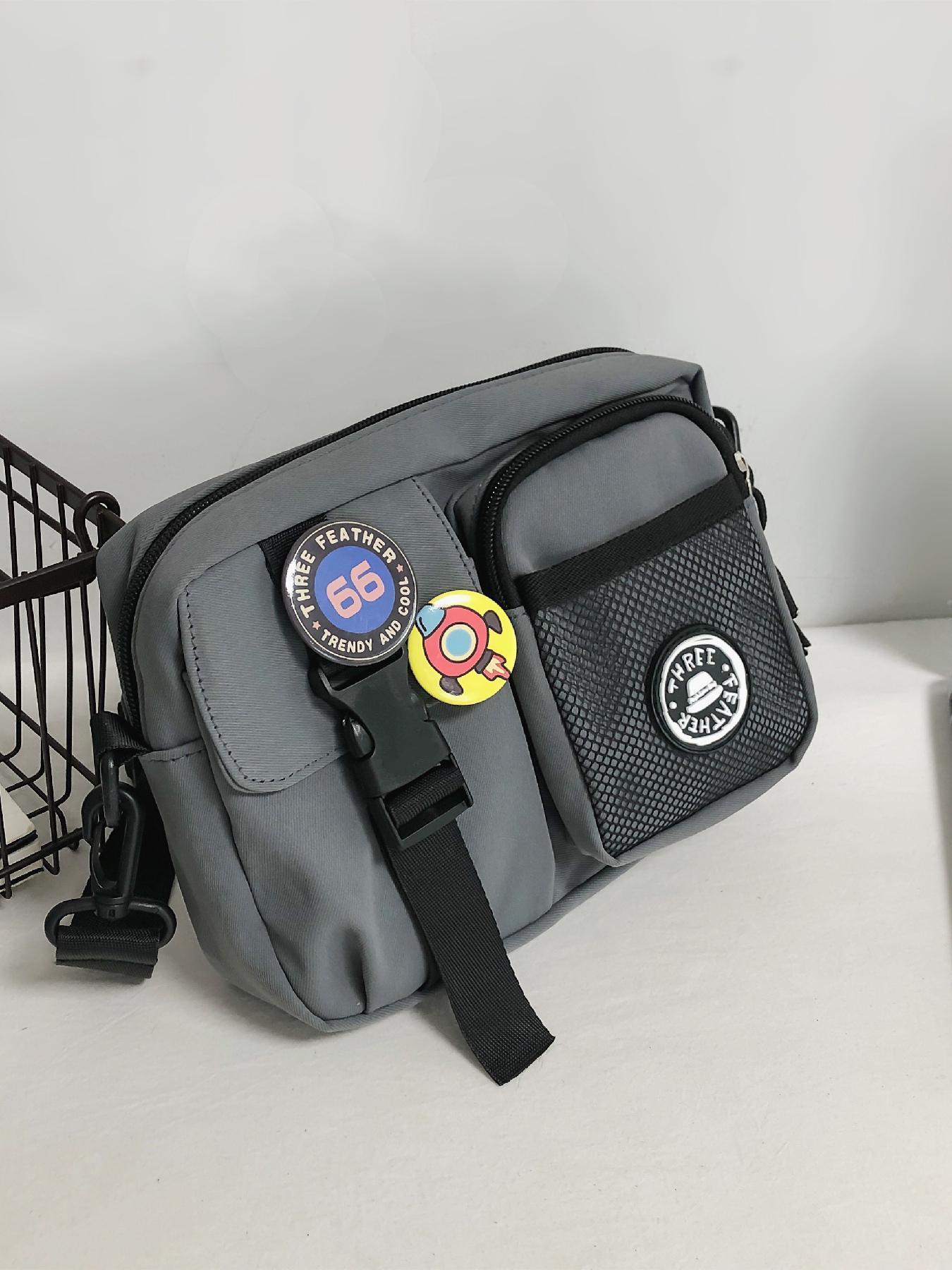 Unisex Casual Plain Color Release Buckle Crossbody Bag with Astronaut Charm, Fashionable Versatile Zipper Crossbody Bag with Random Color Badge, Trendy Shoulder Bag for Daily Use, Casual Messenger Bags, Stylish Crossbody Bags