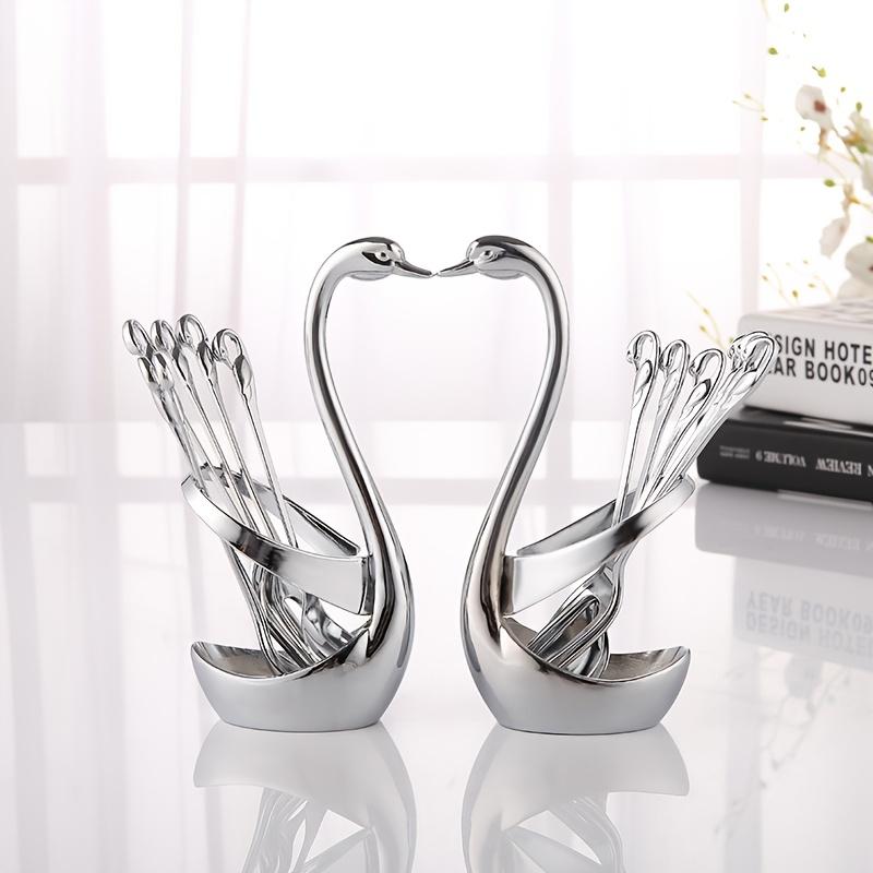 A 7pcs Stylish Cutlery Holder Designed Like a Swan, Including One Swan And Three Forks And Spoons Made of Zinc Alloy. This Elegant Stainless Steel Cutlery Rack Comes with a Complimentary Set of Forks And Spoons