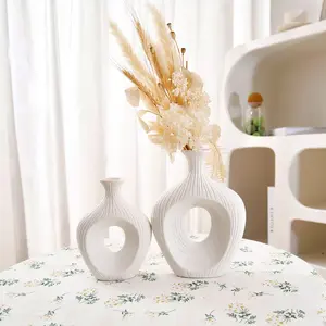 Set of Two Matte Elliptical Vases with Vertical Cutouts, Minimalist Geometric Ceramic Decor, Living Room Dried Flower Display