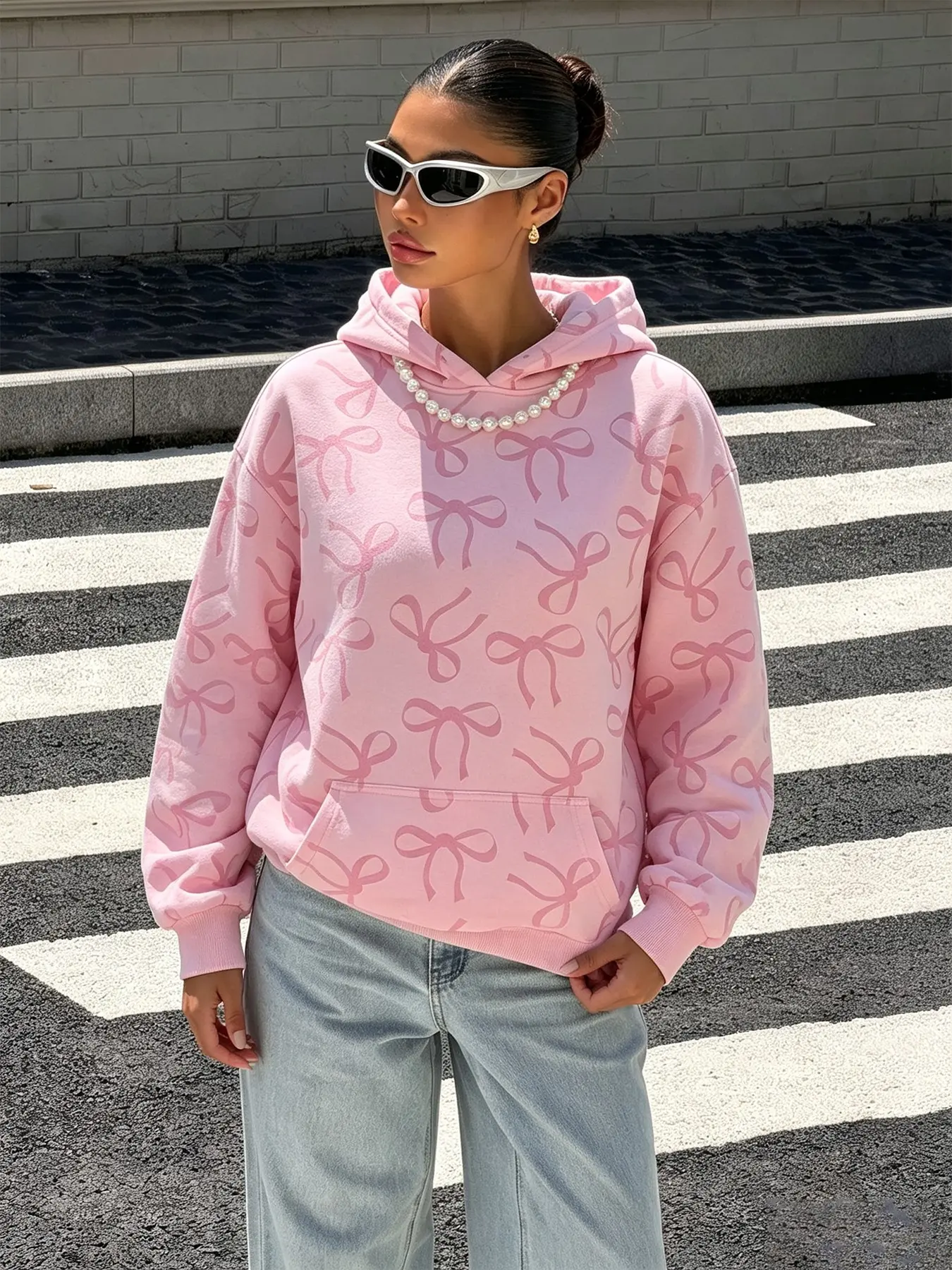 Autumn women's pink bow print hoodie, perfect for everyday home wear, parties, brunch dates, and cute casual outings, giving a stylish autumn vibe for women. #PinkTop #BowHoodie #TrendyLoungewear