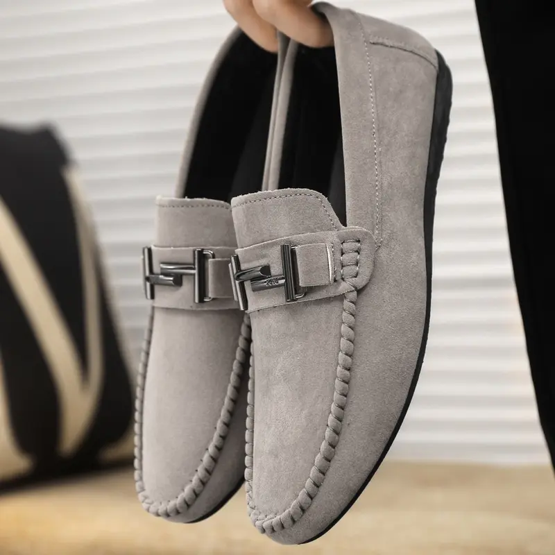 New men's loafers, PU Leather Shoes, for spring and autumn, designed for young people. Featuring metal buckles, slip-on style, soft soles, these business casual moccasins are versatile for daily commuting.