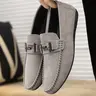 New men's loafers, PU Leather Shoes, for spring and autumn, designed for young people. Featuring metal buckles, slip-on style, soft soles, these business casual moccasins are versatile for daily commuting.