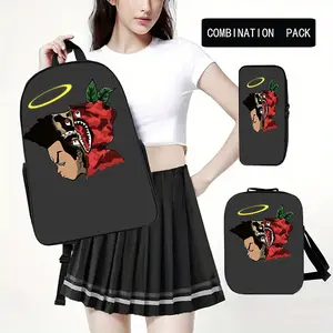 This stylish three-piece backpack features a shark mouth design, adjustable shoulder straps, a polyester lining, and a zipper. It is hand washable. Suitable for all body types, it is adorned with appliqué and printed details, making it ideal for travel.