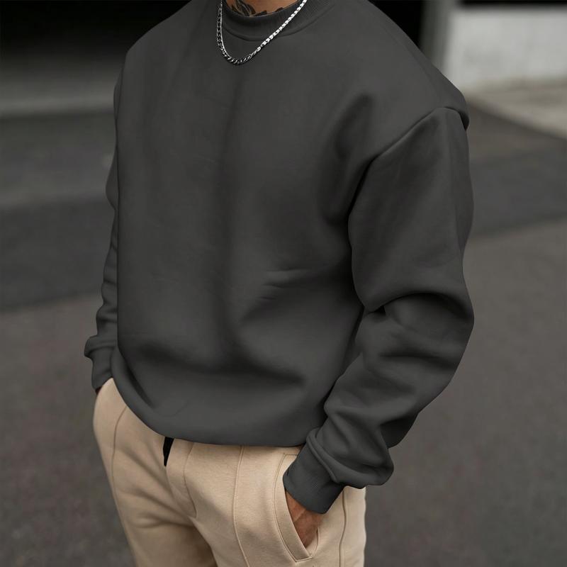 Men's breathable cotton padded long-sleeved round-neck shirt, with a loose and smooth fit, and a soft and smooth fabric. This classic basic piece can easily create a street style outfit and enhance the fashion taste of simple urban men.