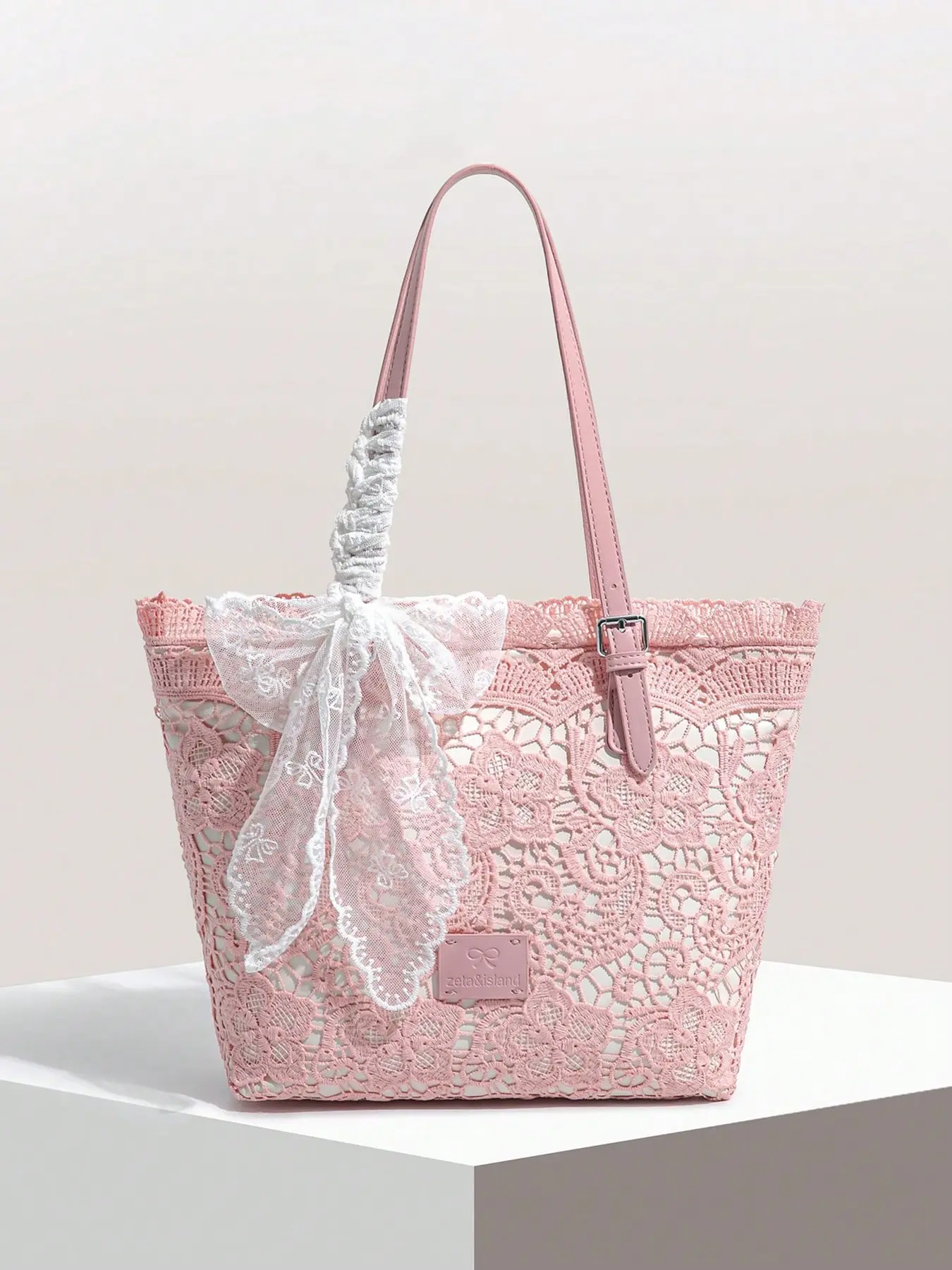 Elegant, sweet, relaxed and versatile lace tote bag, large capacity fashionable and niche design single shoulder bag, lace bow strap design, suitable for beach vacations, daily commuting, and friend gatherings