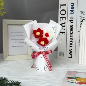 A bouquet of thoughtful wool puffs is handmade, and the general holiday gift is matched with a gift bag.