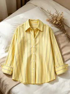 A women's fashionable yellow striped minimalist style long sleeve shirt with a refreshing color scheme and a hanging fabric that is comfortable and breathable, suitable for commuting, playing, indoor and outdoor wear