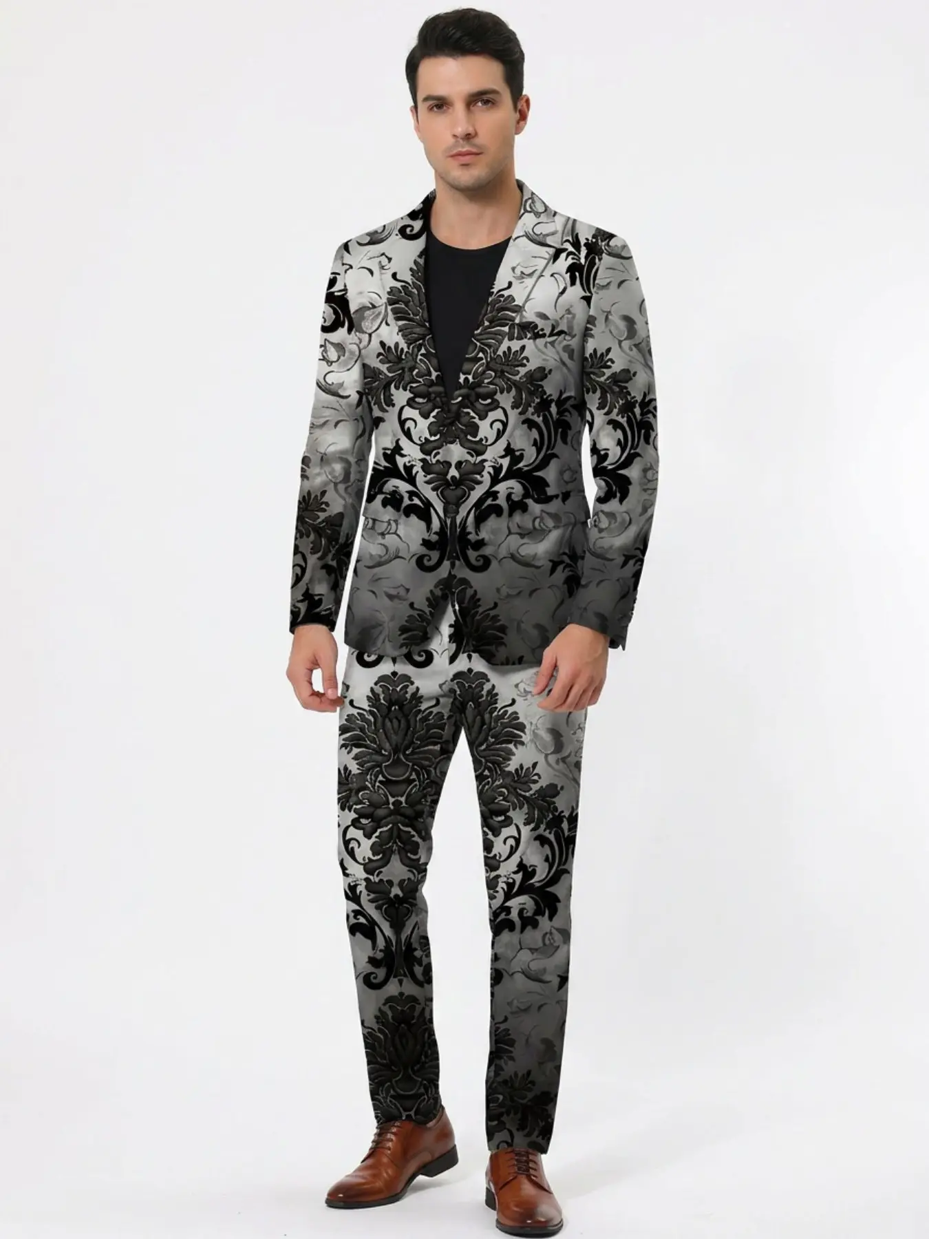 Men's slim-fit suit jacket paired with matching floral trousers, an evening/stage formal suit. A vintage Baroque two-piece suit with a subtle floral print on a blue, gray-black, and light purple background.