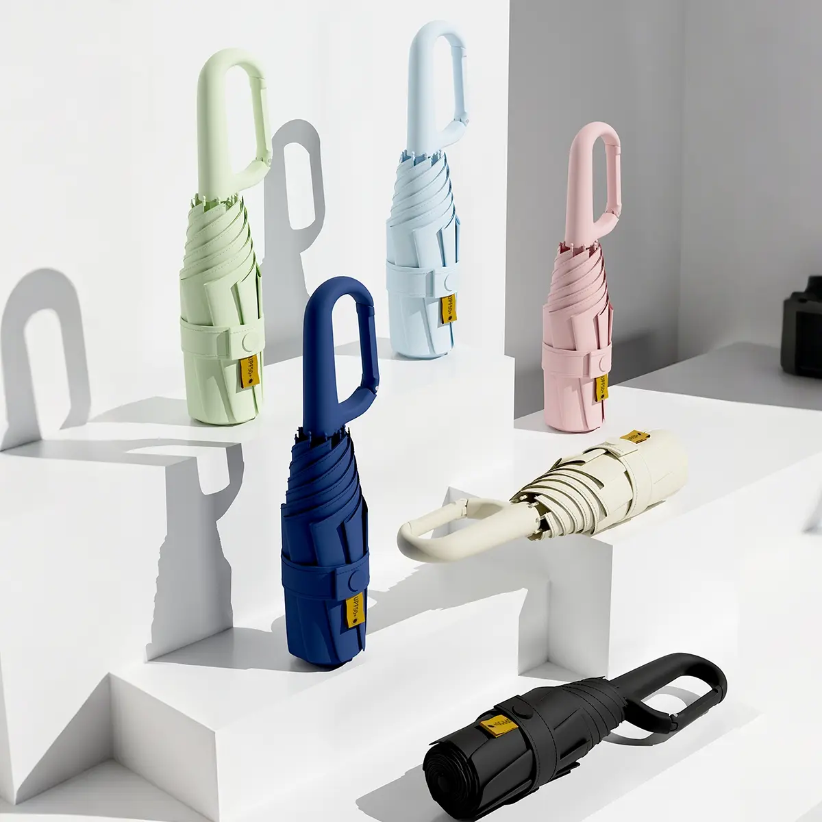 1 piece of minimalist, ultra-light, portable and stylish capsule Folding Lightweight Umbrella. It provides sun protection and UV resistance, suitable for both sunny and rainy days. This mini foldable pocket umbrella is for men and women.
