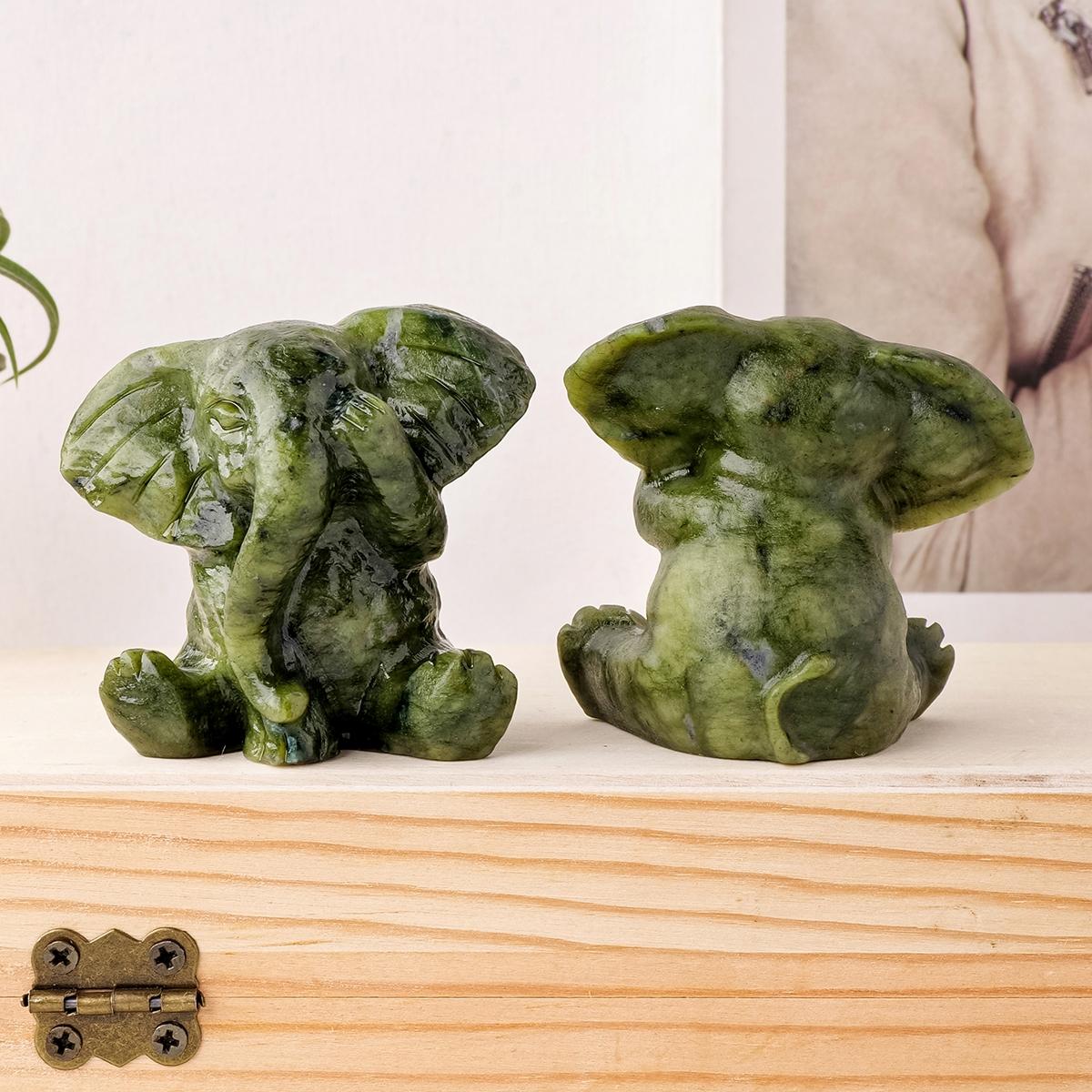 A Natural Jade Elephant Ornament—A Hand-Carved Masterpiece Infused with Spiritual Energy; A Serene Home Décor Accent and Healing Crystal Art Piece—A Distinctive Gift Rich in Symbolic Meaning. A Natural Jade Elephant Ornament—A Hand-Carved Masterpiece Infused with Spiritual Energy; A Serene Home Décor Accent and Healing Crystal Art Piece—A Distinctive Gift Rich in Symbolic Meaning.