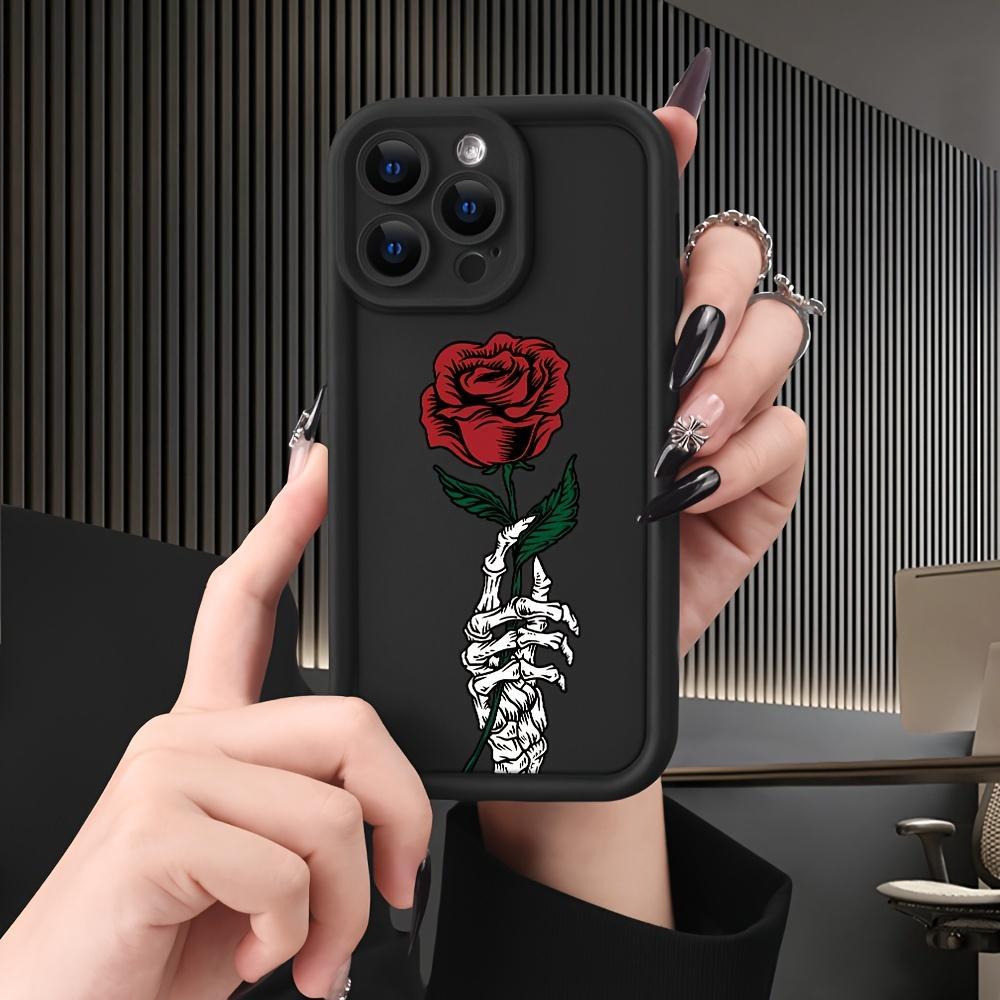 Black Phone Cover Designed for Iphone Models 16 Pro Max, 15 Plus, 14, 13, 12, 11, XR, And XS Featuring a Skull And Rose Design, Made from Anti-Scratch And Shockproof TPU Material for Drop Protection.