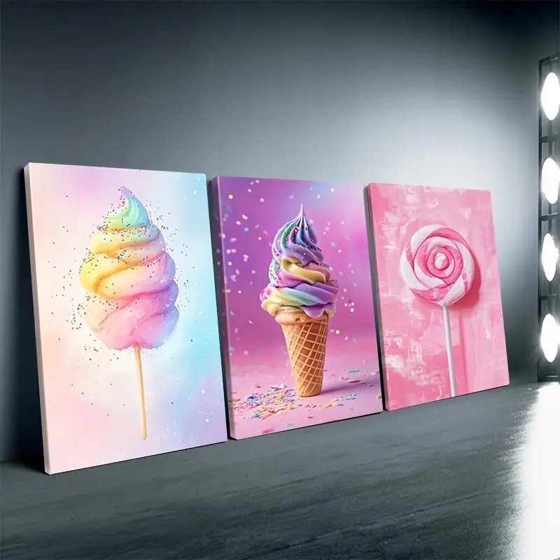 The physical product is a flat, framed item. It is a set of 3 2D flat modern canvas paintings with a candy theme, featuring repeating rectangular prints of rainbow ice cream and candies, suitable for bedroom and room decoration