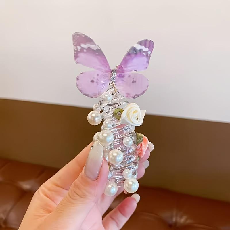 This set of three exquisite mesh butterfly-shaped telephone cord hair ties is perfect for girls.  Featuring a cute beaded flower design, these sweet hair accessories are suitable for everyday wear and parties.