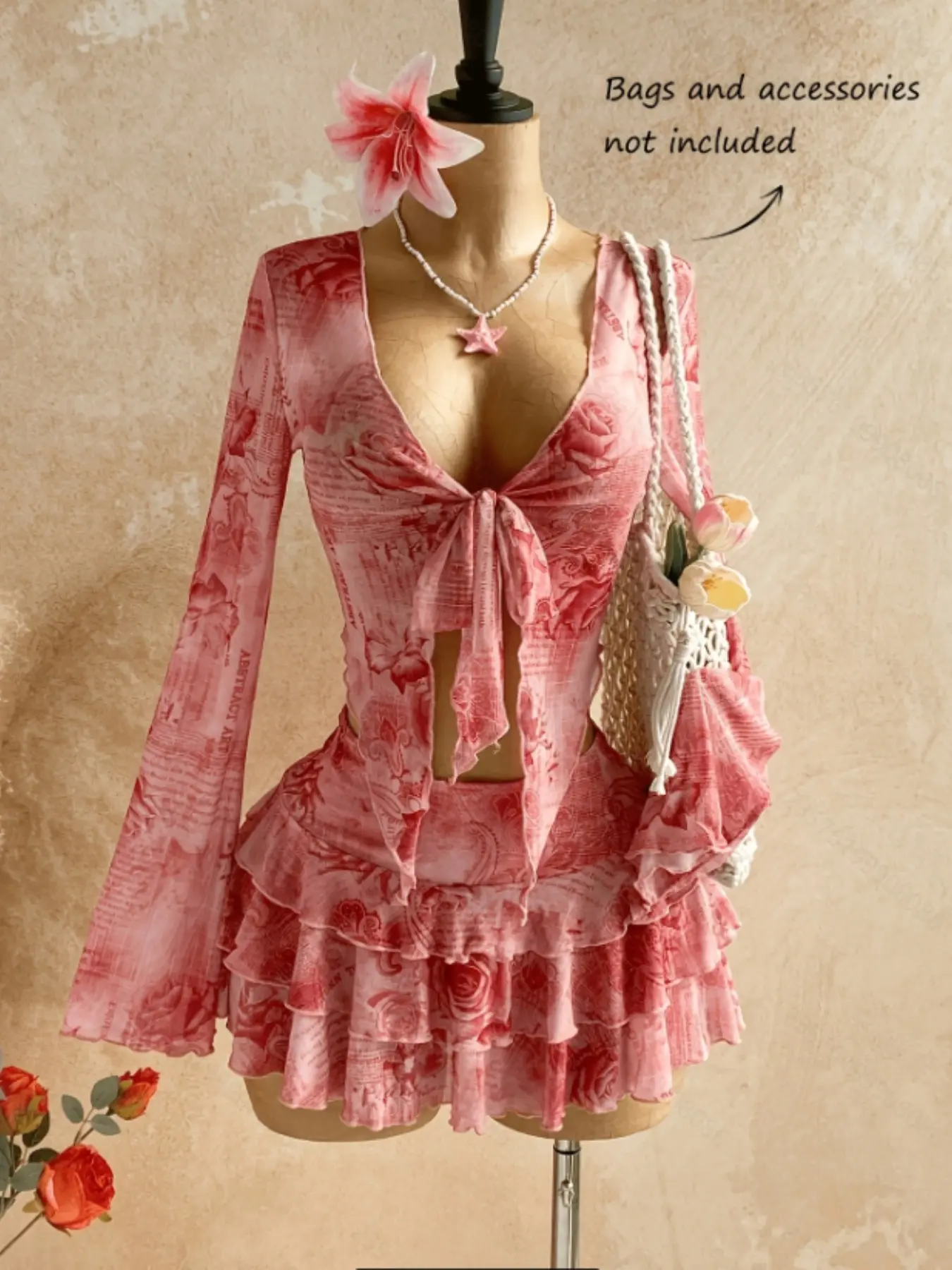 Vintage Rose Print Co-ord Set. 🥀 Featuring a deep V-neckline with self-tie detail and tiered ruffle mini skirt. A dreamy ensemble.